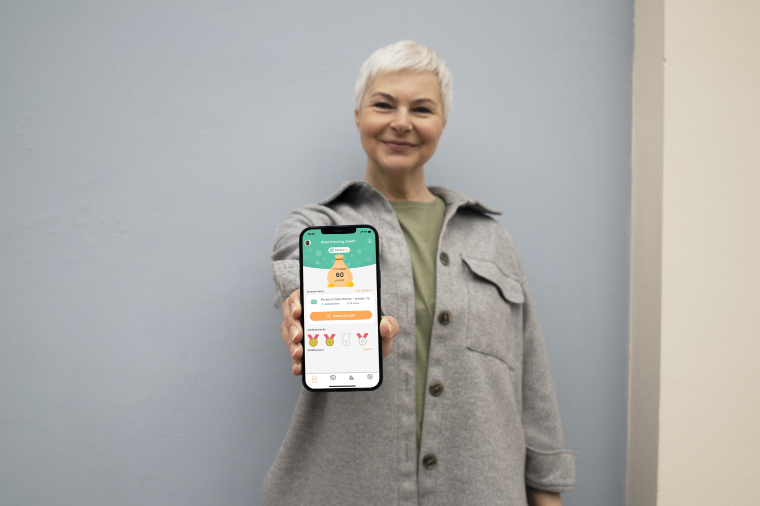 Woman showing mobile